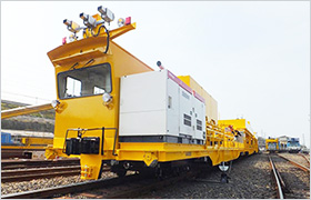 逸脱防止ガード敷設運搬車の写真